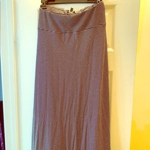 Long, flowing black and white skirt.